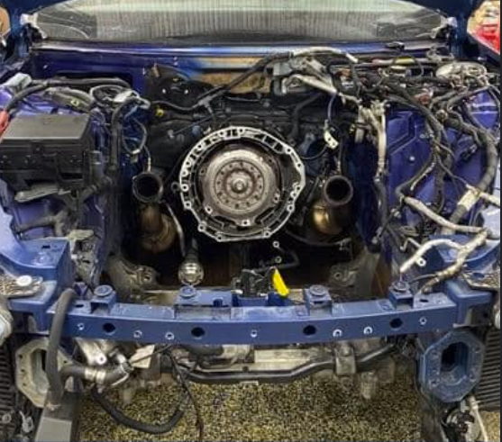 Maserati engine bay during a major repair at Garage81USA